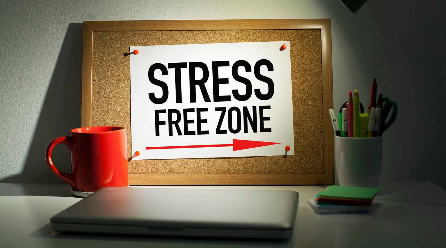 Working Desk with a Sign Reading "Stress Free Zone"