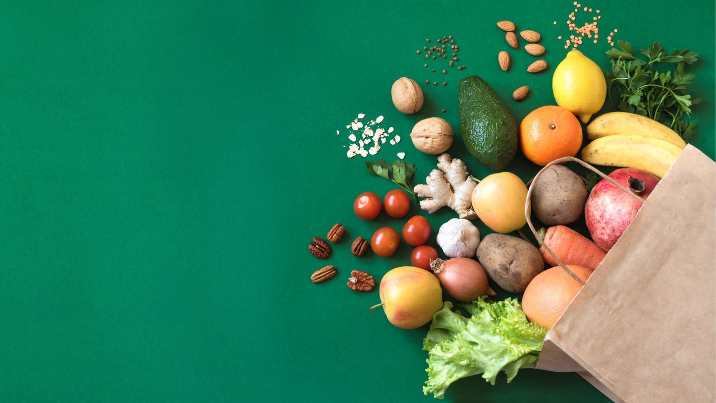 A spilled grocery bag reveals nutrient-dense foods—nuts, avocado, fruits, and greens—highlighting a diet rich in vitamins and minerals to ward off nutrient deficiencies.
