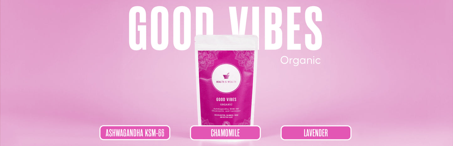 On a gentle purple background, the 'GOOD VIBES' supplement from Health is Wealth is positioned as a natural stress relief supplement. Its magenta packaging, adorned with white mandala designs, highlights organic supplements like KSM-66 Ashwagandha, Chamomile, and Lavender—key ingredients known for their calming properties. Marketed as stress relief capsules, this organic plant supplement promotes relaxation, focus, lowers stress and improves sleep.